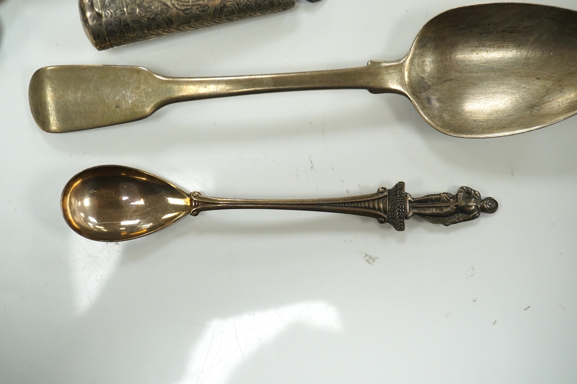 A set of four George V silver dog nose spoons by Tessiers Ltd, London, 1932/5/6, 16.1cm, a silver cigarette holder case and sundry minor flatware including two plated items, weighable silver 16.5oz. Condition - poor to f